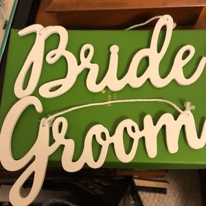 White bride and groom door hanger set
